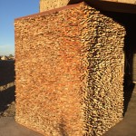wood door - Recycled wood becomes a revolving door to the wine cellar.